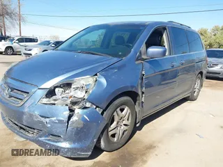 2006 Honda Odyssey EX-L with VIN 5FNRL38796B099851, listed as a IAAI auction lot 41555109 with 154,707 mi miles and . Bid and sale history available at DreamBid. Image 18.