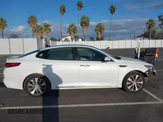2016 Kia Optima SXL Turbo with VIN 5XXGV4L20GG023095, listed as a IAAI auction lot 41580598 with 155,002 mi miles. Bid and sale history available at carsss.com. Image 13.