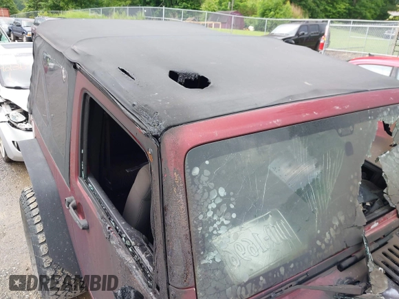 2012 Jeep Wrangler Sport with VIN 1C4AJWAG9CL203018, listed as a IAAI auction lot 42377899 with Not provided miles and . Bid and sale history available at DreamBid. Image 17.