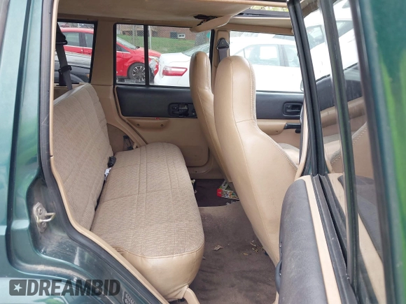 2001 Jeep Cherokee Sport with VIN 1J4FF48S51L561438, listed as a IAAI auction lot 41965207 with 222,868 mi miles and . Bid and sale history available at DreamBid. Image 8.