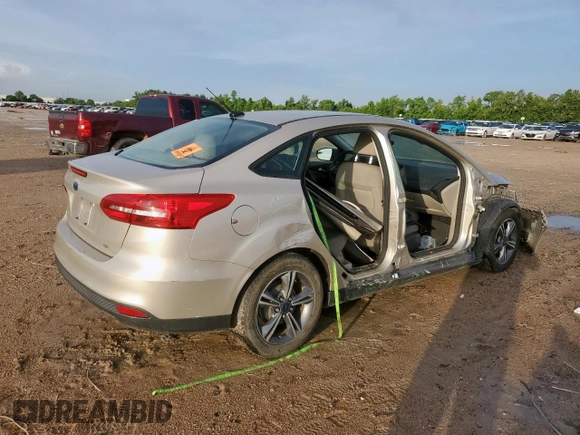 2017 Ford Focus SE with VIN 1FADP3F22HL274842, listed as a Copart auction lot 60970745 with 154,210 mi miles and Salvage title. Bid and sale history available at DreamBid. Image 3.