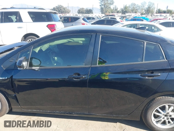 2016 Toyota Prius Two with VIN JTDKBRFU1G3515941, listed as a IAAI auction lot 41053971 with 110,585 mi miles. Bid and sale history available at carsss.com. Image 13.