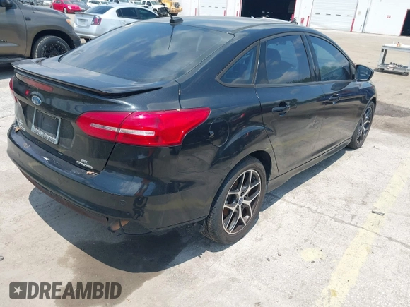 2015 Ford Focus SE with VIN 1FADP3F21FL280550, listed as a IAAI auction lot 42200104 with 146,175 mi miles and . Bid and sale history available at DreamBid. Image 4.