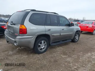 2005 GMC Envoy SLT with VIN 1GKDT13S352129944, listed as a IAAI auction lot 41527180 with 188,541 mi miles. Bid and sale history available at carsss.com. Image 4.