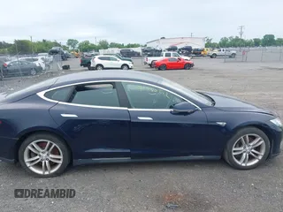 2014 Tesla Model S 60 with VIN 5YJSA1H19EFP32063, listed as a IAAI auction lot 42360872 with 103,495 mi miles and . Bid and sale history available at DreamBid. Image 13.
