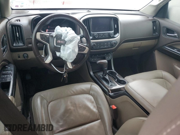 2016 GMC Canyon 2WD SLT with VIN 1GTG5DE39G1176821, listed as a Copart auction lot 86958264 with 127,514 mi miles and Salvage Title. Bid and sale history available at carsss.com. Image 8.