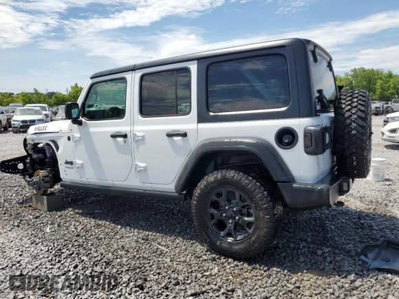 2021 Jeep Wrangler Unlimited Willys with VIN 1C4HJXDG3MW752441, listed as a Copart auction lot 55881925 with 61,751 mi miles and Salvage title. Bid and sale history available at DreamBid. Image 2.