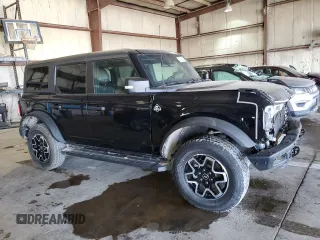 2023 Ford Bronco with VIN 1FMEE5DP2PLA95077, listed as a Copart auction lot 56154525 with 102,335 mi miles and Salvage title. Bid and sale history available at DreamBid. Image 4.