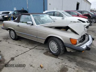 1989 Mercedes-Benz 560 SL with VIN WDBBA48D0KA099001, listed as a Copart auction lot 82129274 with 95,805 mi miles and Clean Title. Bid and sale history available at DreamBid. Image 4.