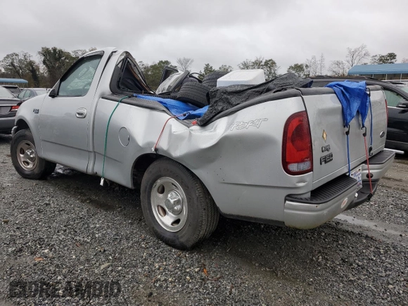 2003 Ford F-150 XL with VIN 1FTRF172X3NB77391, listed as a Copart auction lot 80657174 with Not Provided miles and Salvage Title. Bid and sale history available at DreamBid. Image 2.