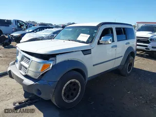 2008 Dodge Nitro SXT with VIN 1D8GU28K28W114449, listed as a IAAI auction lot 41432734 with 246,362 mi miles. Bid and sale history available at carsss.com. Image 16.