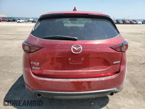 2019 Mazda CX-5 Grand Touring with VIN JM3KFBDM7K1668396, listed as a Copart auction lot 59732785 with 23,855 mi miles and Salvage title. Bid and sale history available at DreamBid. Image 6.