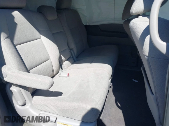 2016 Honda Odyssey SE with VIN 5FNRL5H39GB048487, listed as a IAAI auction lot 42059132 with 140,411 mi miles and . Bid and sale history available at DreamBid. Image 8.