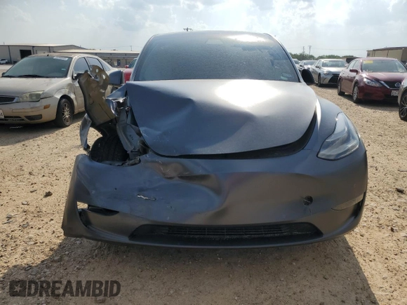 2022 Tesla Model Y Performance with VIN 7SAYGDEF2NF460730, listed as a Copart auction lot 54127945 with 59,735 mi miles and Salvage title. Bid and sale history available at DreamBid. Image 5.