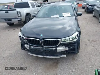 2019 BMW 6 Series 640i xDrive with VIN WBAJV6C50KBK08934, listed as a IAAI auction lot 41588796 with 61,411 mi miles and . Bid and sale history available at carsss.com. Image 6.
