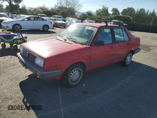 1990 Volkswagen Jetta z VIN WVWRA21G8LW118049, wystawiony jako Copart lot #83110834 z przebiegiem 114 813 mil mil oraz Szkoda całkowita • Salvage title. Historia ofert i sprzedaży dostępna na DreamBid. Obrazek 1.