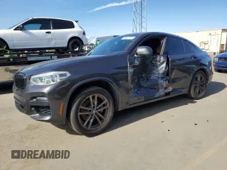 2020 BMW X4 xDrive30i with VIN 5UX2V1C04L9C32419, listed as a Copart auction lot 46427975 with 58,623 mi miles and Salvage Title. Bid and sale history available at carsss.com. Image 1.