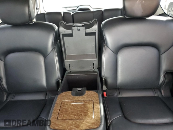2017 Infiniti QX80 z VIN JN8AZ2NF1H9643990, wystawiony jako Copart lot #55598085 z przebiegiem 129 961 mil mil oraz Szkody całkowita. Historia ofert i sprzedaży dostępna na DreamBid. Obrazek 10.