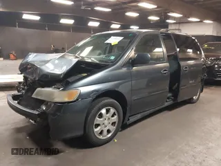 2004 Honda Odyssey EX-RES z VIN 5FNRL18814B092516, wystawiony jako IAAI lot #42108211 z przebiegiem 214 312 mil mil oraz . Historia ofert i sprzedaży dostępna na DreamBid. Obrazek 19.