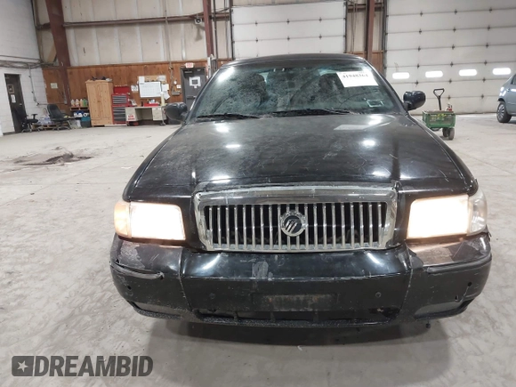 2008 Mercury Grand Marquis LS z VIN 2MEFM75V18X617284, wystawiony jako IAAI lot #41948364 z przebiegiem 106 294 mil mil oraz . Historia ofert i sprzedaży dostępna na DreamBid. Obrazek 6.
