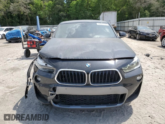 2018 BMW X2 sDrive28i z VIN WBXYJ3C36JEJ64948, wystawiony jako Copart lot #54049595 z przebiegiem 60 168 mil mil oraz Szkoda całkowita • Salvage title. Historia ofert i sprzedaży dostępna na DreamBid. Obrazek 5.