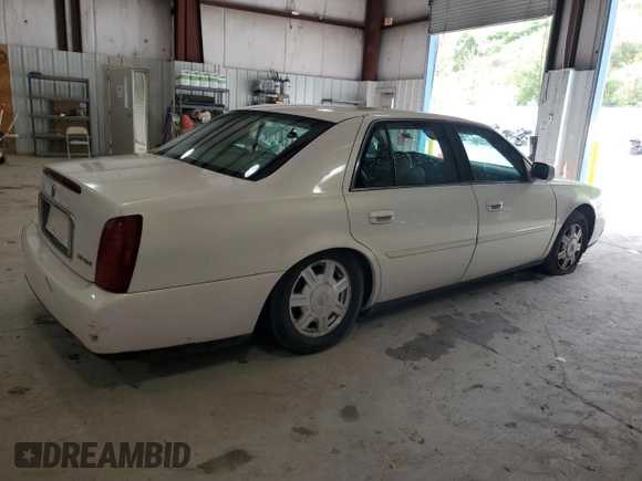 2004 Cadillac DeVille z VIN 1G6KD54Y84U137828, wystawiony jako Copart lot #53702265 z przebiegiem 156 439 mil mil oraz Szkody całkowita. Historia ofert i sprzedaży dostępna na DreamBid. Obrazek 3.