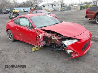 2013 Scion FR-S with VIN JF1ZNAA1XD1719798, listed as a IAAI auction lot 41863095 with 137,670 mi miles. Bid and sale history available at carsss.com. Image 1.