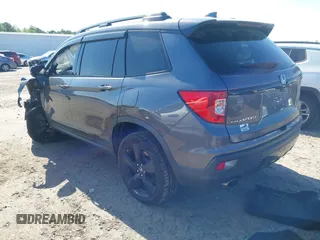 2019 Honda Passport Elite with VIN 5FNYF8H04KB004657, listed as a IAAI auction lot 41993974 with 90,964 mi miles and . Bid and sale history available at DreamBid. Image 3.