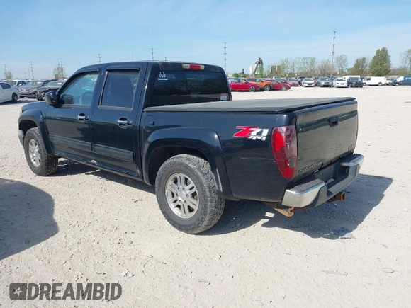 2011 GMC Canyon SLE1 with VIN 1GTH6MFE5B8104838, listed as a IAAI auction lot 42120959 with 188,277 mi miles. Bid and sale history available at carsss.com. Image 3.