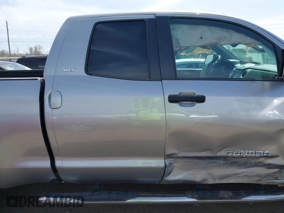 2018 Toyota Tundra 2WD SR with VIN 5TFRM5F16JX133735, listed as a IAAI auction lot 41818455 with 148,456 mi miles. Bid and sale history available at carsss.com. Image 13.