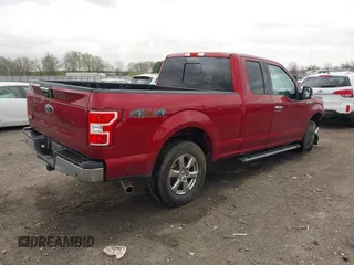 2018 Ford F-150 XL with VIN 1FTFX1E51JKF98962, listed as a IAAI auction lot 41827587 with 128,031 mi miles and . Bid and sale history available at DreamBid. Image 4.