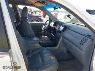 2004 Honda Pilot EX with VIN 5FNYF186X4B010171, listed as a IAAI auction lot 41999030 with 276,311 mi miles. Bid and sale history available at carsss.com. Image 5.