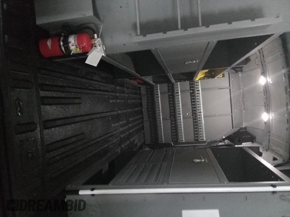 2023 Ford Transit Cargo z VIN 1FTBR1X86PKC02291, wystawiony jako IAAI lot #42791621 z przebiegiem 32 389 mil mil oraz . Historia ofert i sprzedaży dostępna na DreamBid. Obrazek 15.