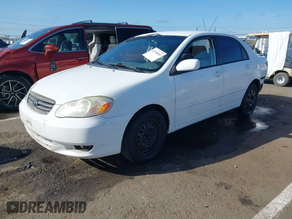 2004 Toyota Corolla CE with VIN JTDBR32E540051928, listed as a IAAI auction lot 41958483 with 299,999 mi miles. Bid and sale history available at carsss.com. Image 18.