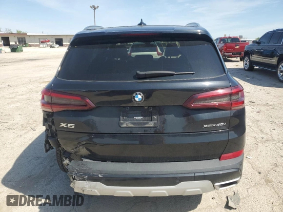 2021 BMW X5 xDrive40i с VIN 5UXCR6C06M9E80968, выставлен на аукционе Copart как лот 54848645 с пробегом 52 033 миль миль и Списание • Salvage title. История ставок и продаж доступна на DreamBid. Изображение 6.