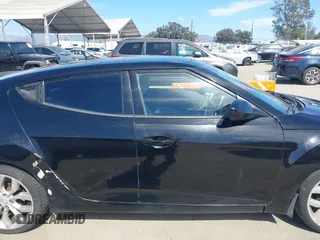2013 Hyundai Veloster w/Black Int with VIN KMHTC6AD4DU132701, listed as a IAAI auction lot 42021759 with 102,840 mi miles and . Bid and sale history available at DreamBid. Image 13.