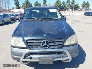 1999 Mercedes-Benz M-Class with VIN 4JGAB54E0XA144438, listed as a IAAI auction lot 41752608 with NaN miles. Bid and sale history available at carsss.com. Image 6.