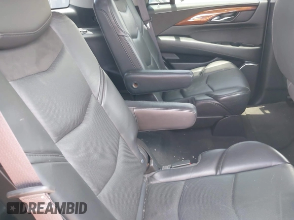 2015 Cadillac Escalade Luxury z VIN 1GYS4BKJ1FR215223, wystawiony jako IAAI lot #42548931 z przebiegiem 145 947 mil mil oraz . Historia ofert i sprzedaży dostępna na DreamBid. Obrazek 8.