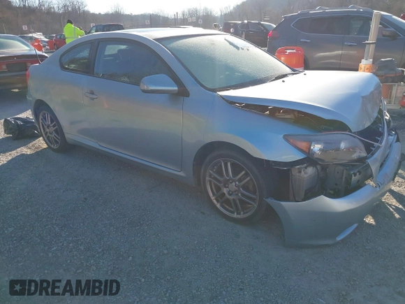 2006 Scion tC with VIN JTKDE177960090990, listed as a IAAI auction lot 41690362 with 197,613 mi miles. Bid and sale history available at carsss.com. Image 1.