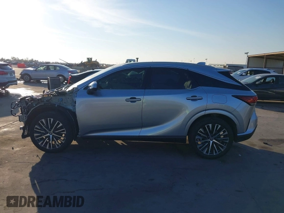 2023 Lexus RX with VIN JTJCHMAA6P2000651, listed as a IAAI auction lot 40700931 with 6,576 mi miles. Bid and sale history available at carsss.com. Image 15.