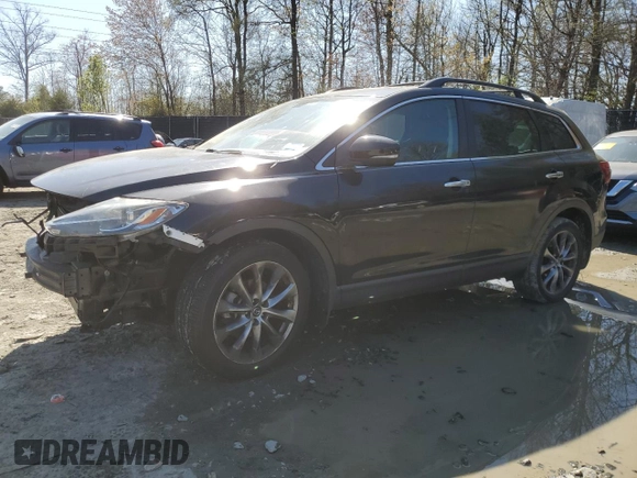 2015 Mazda CX-9 Grand Touring with VIN JM3TB3DV7F0448203, listed as a Copart auction lot 52254895 with 127,141 mi miles and Salvage title. Bid and sale history available at DreamBid. Image 1.