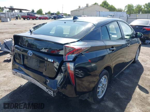 2016 Toyota Prius Two with VIN JTDKBRFU9G3021083, listed as a IAAI auction lot 41986733 with 117,227 mi miles and . Bid and sale history available at DreamBid. Image 4.