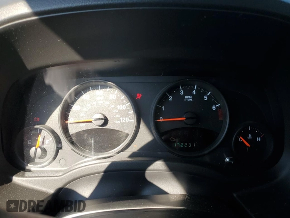 2011 Jeep Patriot Latitude z VIN 1J4NF1GB0BD131856, wystawiony jako Copart lot #56222005 z przebiegiem 172 231 mil mil oraz Szkoda całkowita • Salvage title. Historia ofert i sprzedaży dostępna na DreamBid. Obrazek 9.