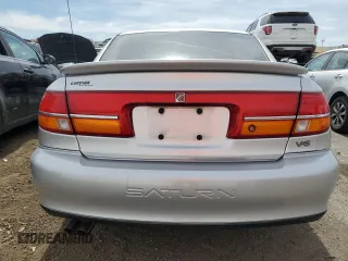 2001 Saturn LS z VIN 1G8JW54R01Y528238, wystawiony jako Copart lot #50344355 z przebiegiem 90 854 mil mil oraz Szkody całkowita. Historia ofert i sprzedaży dostępna na DreamBid. Obrazek 6.