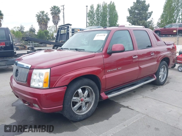 2004 Cadillac Escalade EXT z VIN 3GYEK62N64G127746, wystawiony jako IAAI lot #42135228 z przebiegiem 212 518 mil mil oraz . Historia ofert i sprzedaży dostępna na DreamBid. Obrazek 2.