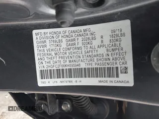 2019 Honda Civic Sedan LX with VIN 2HGFC2F66KH595946, listed as a IAAI auction lot 42017066 with 37,634 mi miles. Bid and sale history available at carsss.com. Image 9.