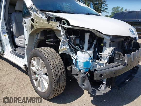 2017 Toyota Sienna with VIN 5TDDZ3DC8HS169754, listed as a IAAI auction lot 42146445 with 70,572 mi miles and . Bid and sale history available at DreamBid. Image 6.