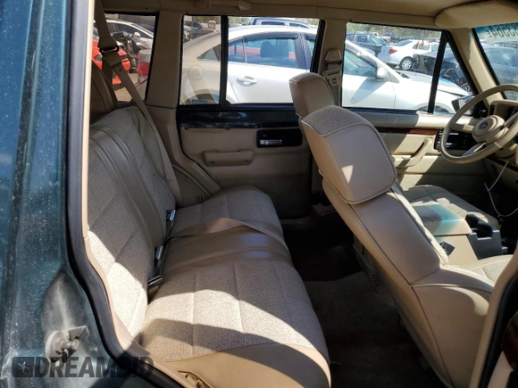 1993 Jeep Cherokee Country with VIN 1J4FJ78S4PL517648, listed as a Copart auction lot 72383564 with 127,156 mi miles and Salvage Title. Bid and sale history available at carsss.com. Image 11.