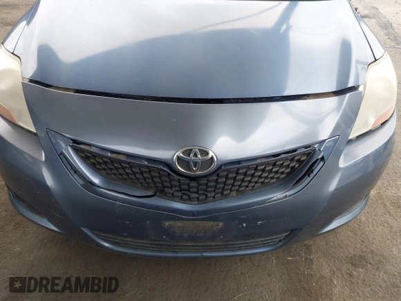 2009 Toyota Yaris with VIN JTDBT903791302911, listed as a IAAI auction lot 42181264 with 183,321 mi miles. Bid and sale history available at carsss.com. Image 6.
