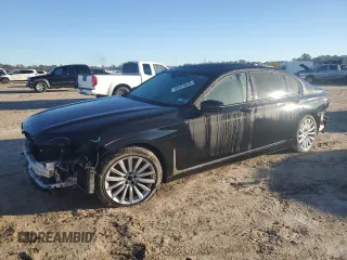 2020 BMW 7 Series 740i with VIN WBA7T2C0XLCE02429, listed as a Copart auction lot 42574835 with 73,970 mi miles and Salvage Title. Bid and sale history available at carsss.com. Image 1.
